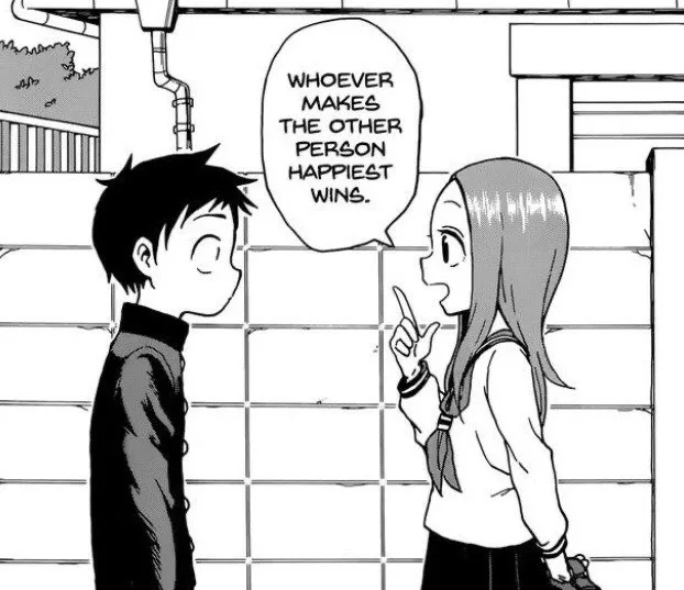 A black-and-white manga panel shows a girl pointing at a boy while speaking. Her speech bubble reads 'WHOEVER MAKES THE…